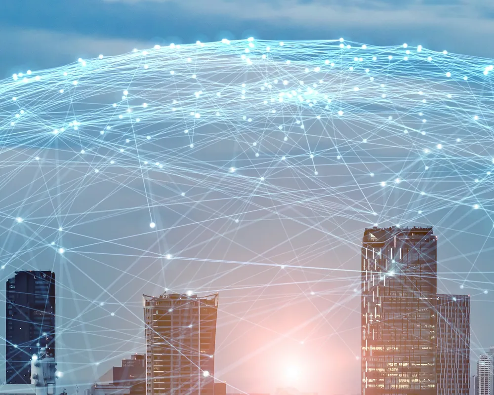 Cityscape with dome network overlay