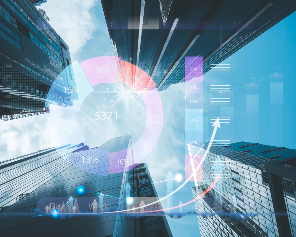 City building with pie chart overlay