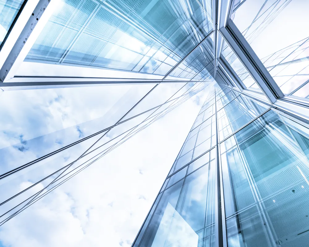 Inside a building looking up at the roof